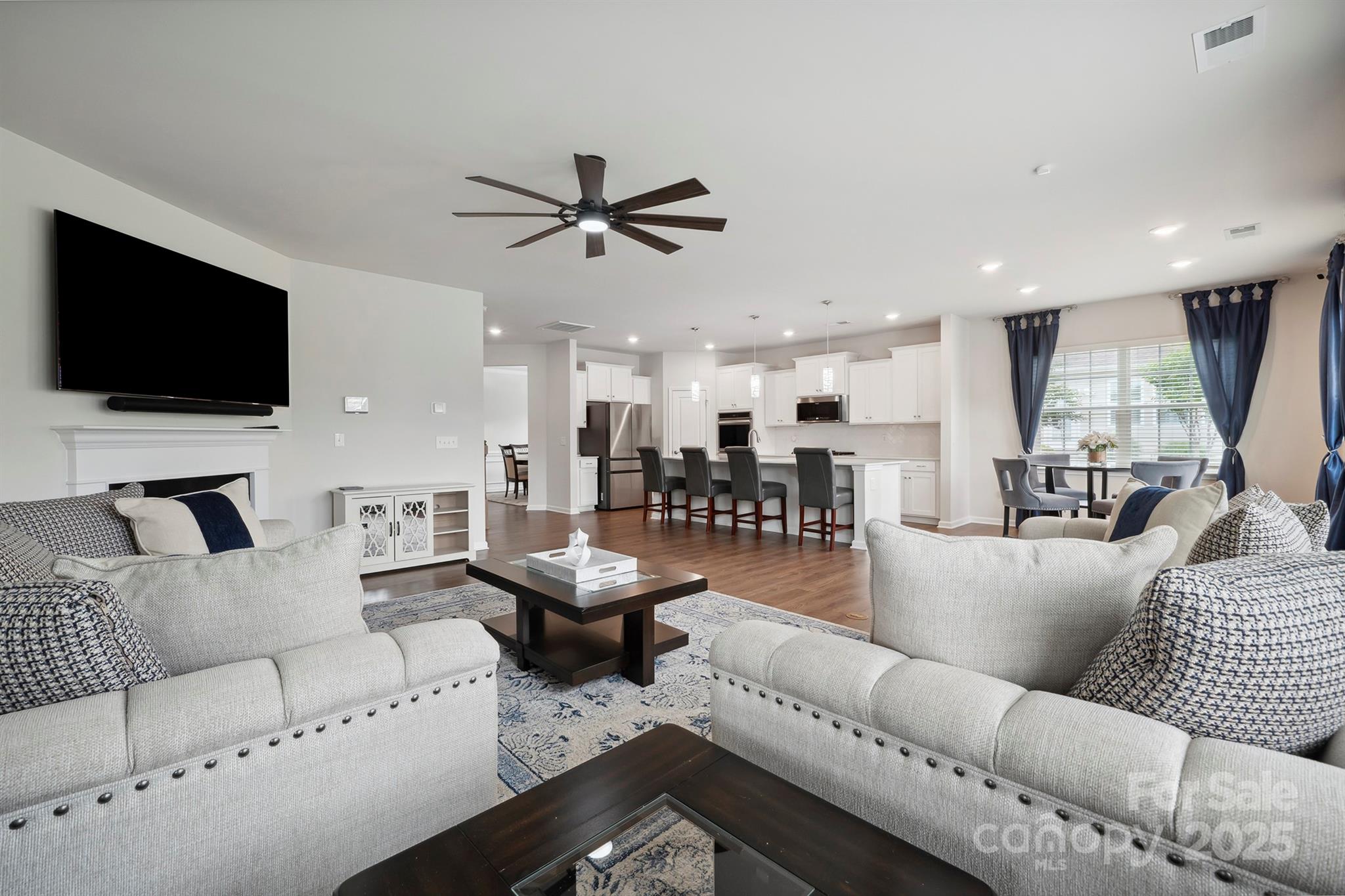 4015 Havenport Circle Fort Mill, SC 29708 - Photo 16 of 47 a living room with furniture and a flat screen tv