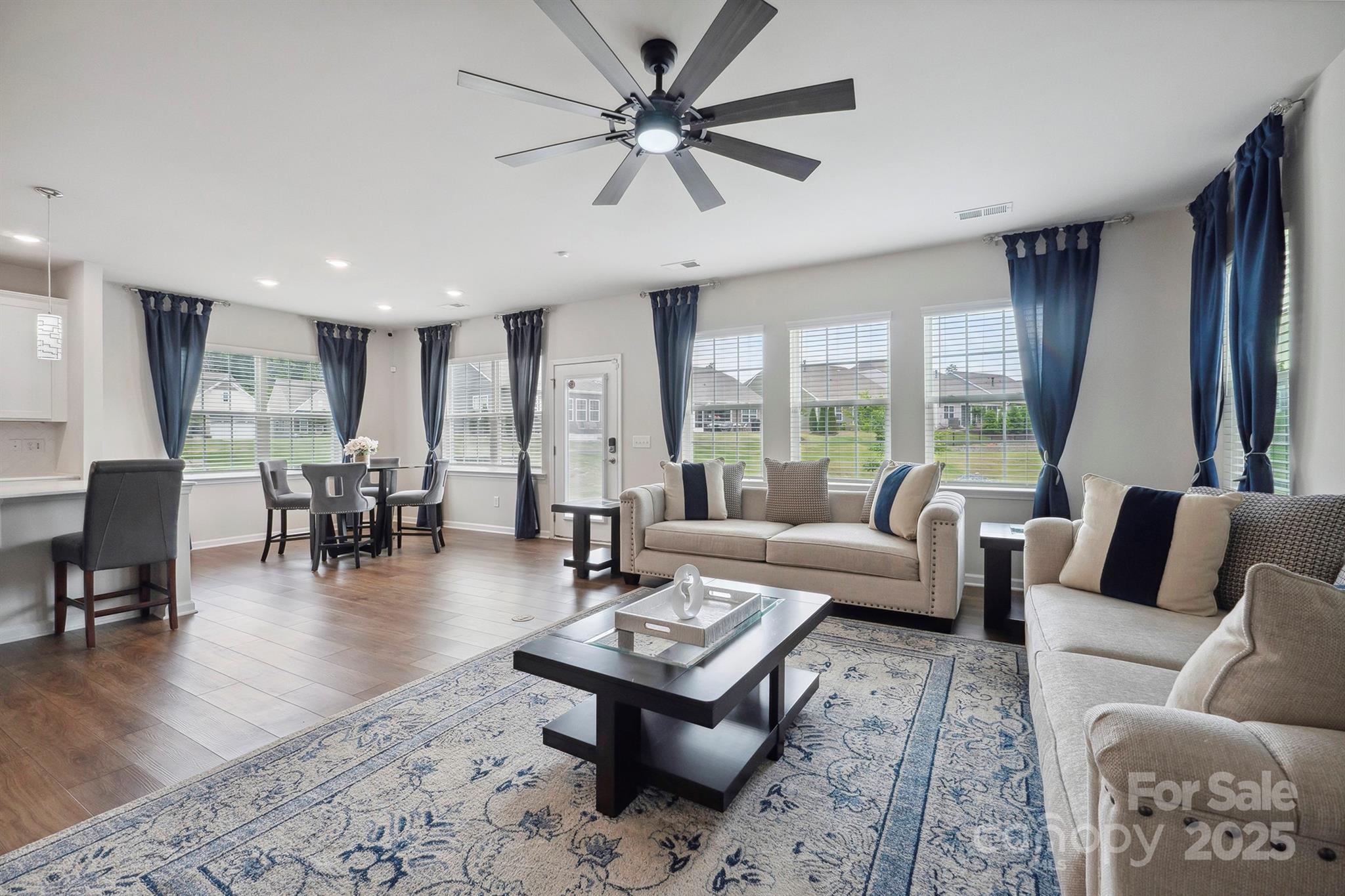 4015 Havenport Circle Fort Mill, SC 29708 - Photo 17 of 47 a living room with furniture and wooden floor