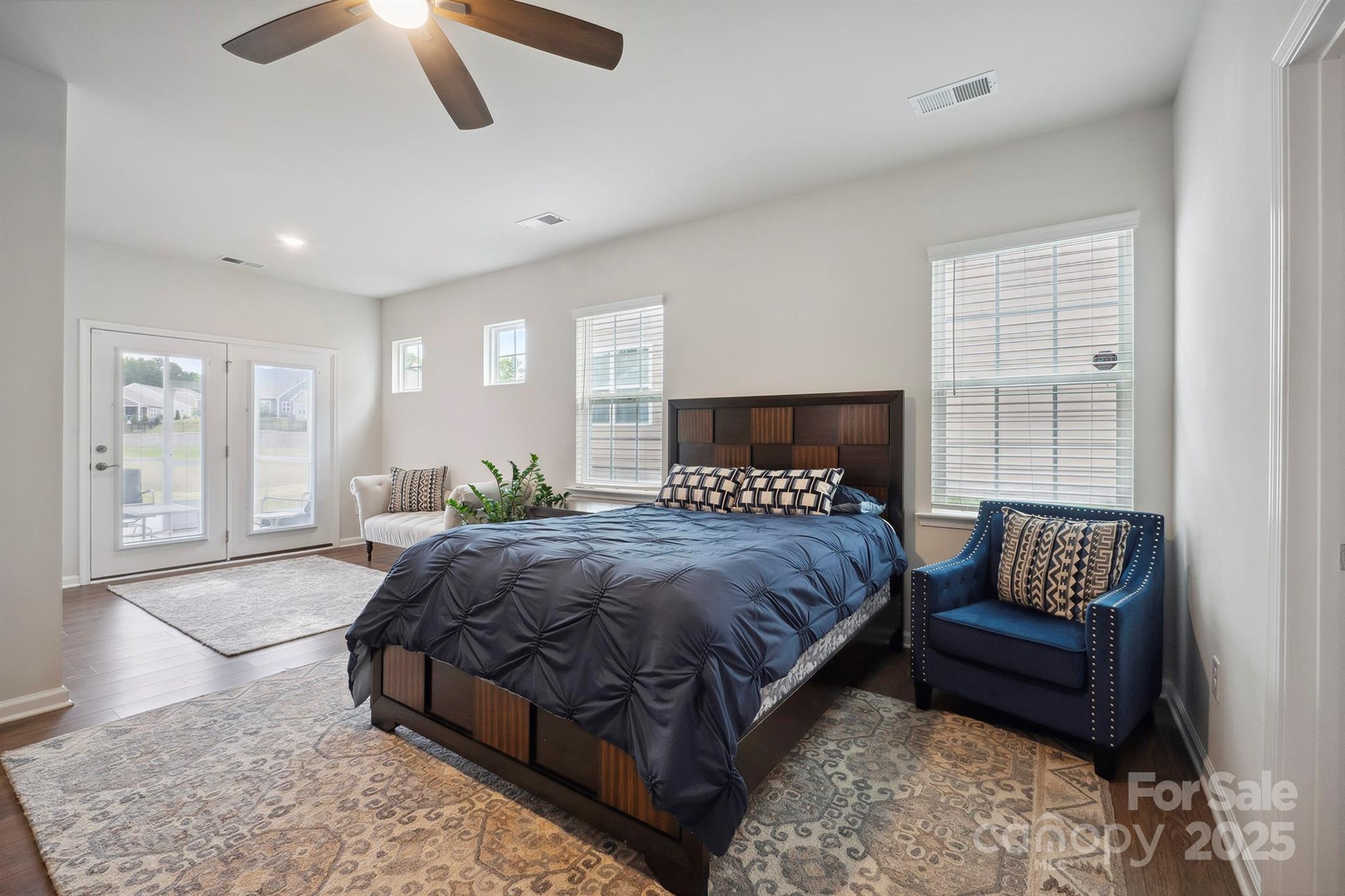 4015 Havenport Circle Fort Mill, SC 29708 - Photo 18 of 47 a bedroom with a large bed and a couch