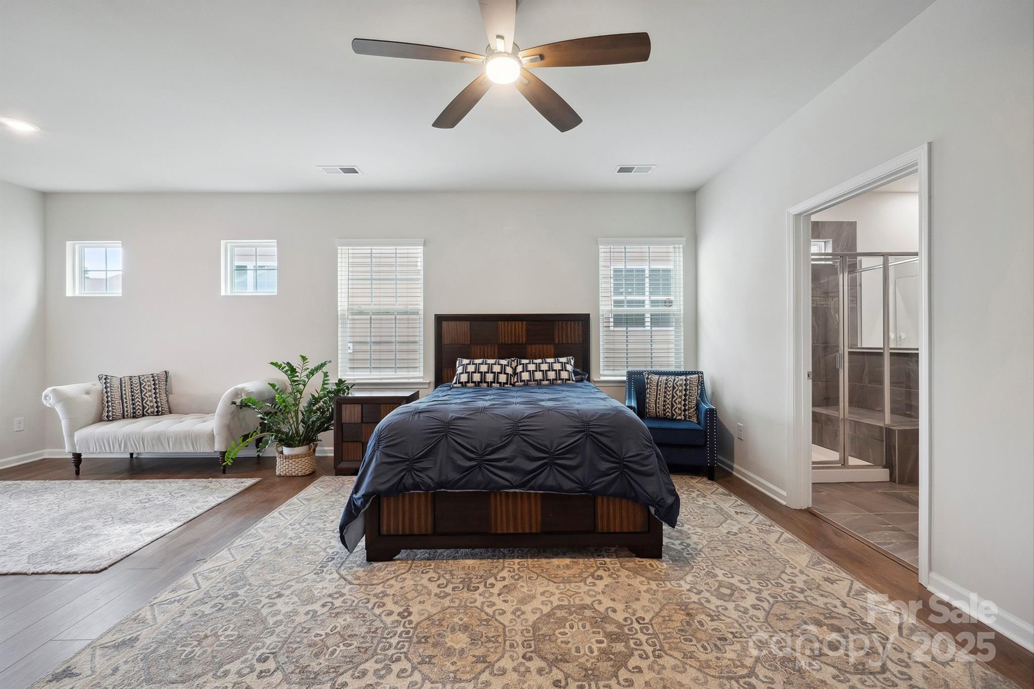 4015 Havenport Circle Fort Mill, SC 29708 - Photo 19 of 47 a bedroom with a bed couch and window