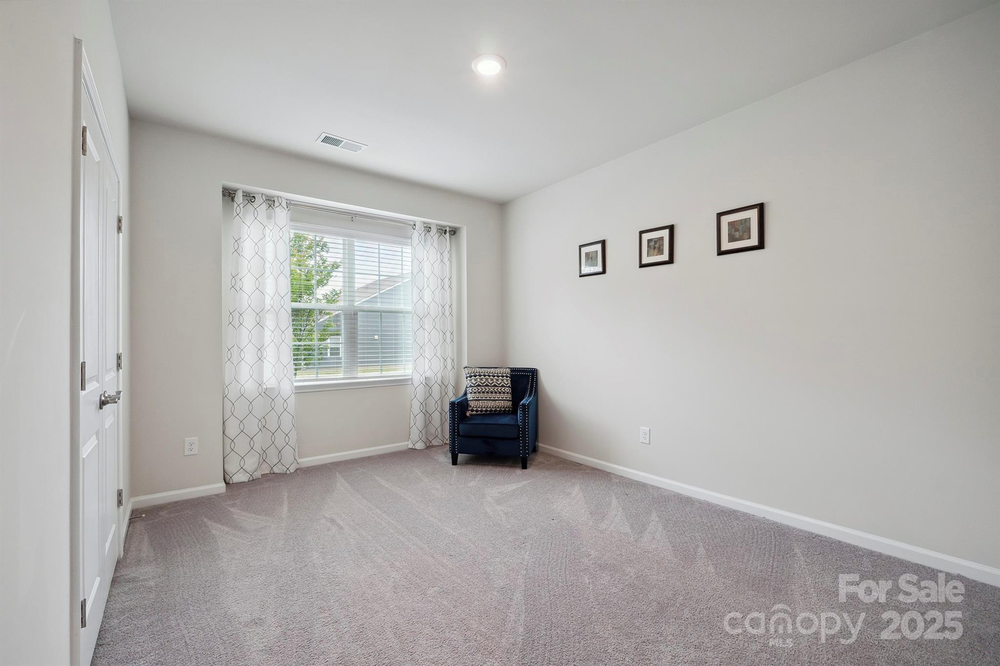 4015 Havenport Circle Fort Mill, SC 29708 - Photo 25 of 47 an empty room with furniture and windows