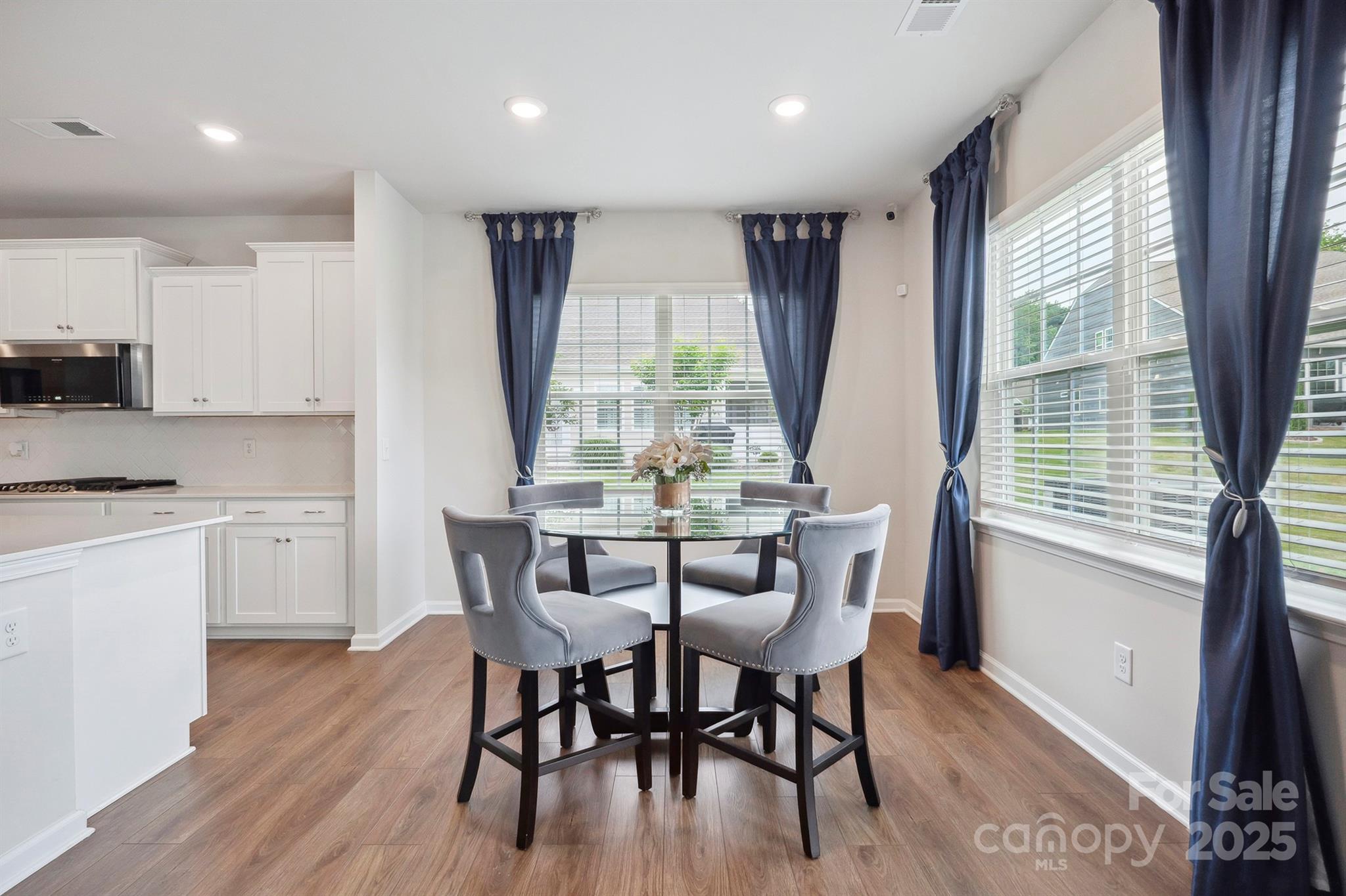 4015 Havenport Circle Fort Mill, SC 29708 - Photo 4 of 47 a view of a dining room with furniture window and wooden floor