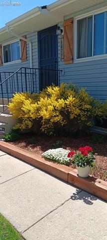 6879 Chippewa Road Colorado Springs, CO 80915 - Photo 3 of 39 Property entrance during the Spring & Summer