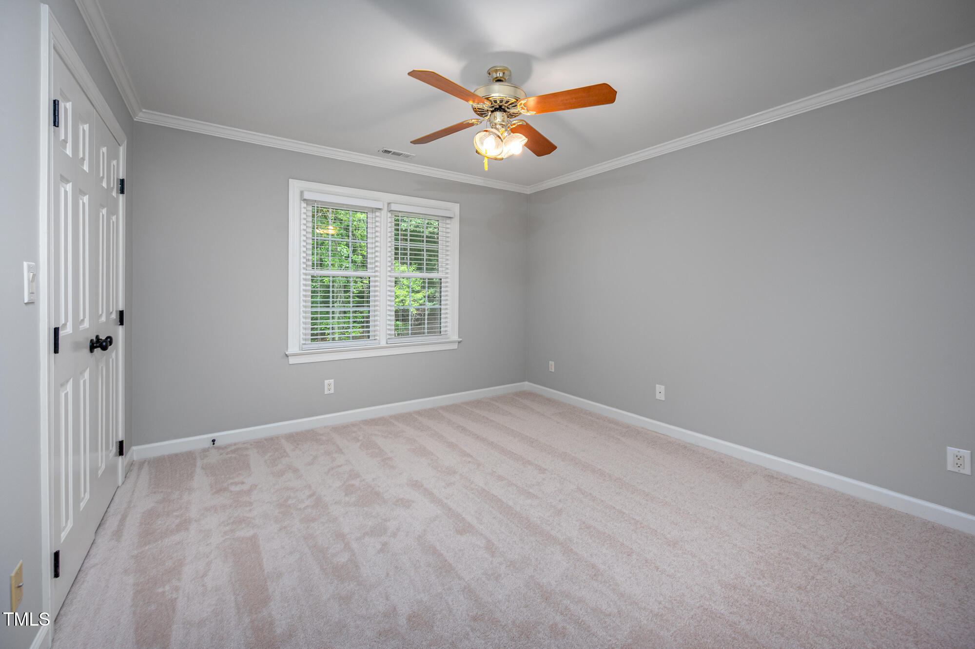 5611 Red Coach Road Durham, NC 27712 - Photo 27 of 51 a view of an empty room with a window