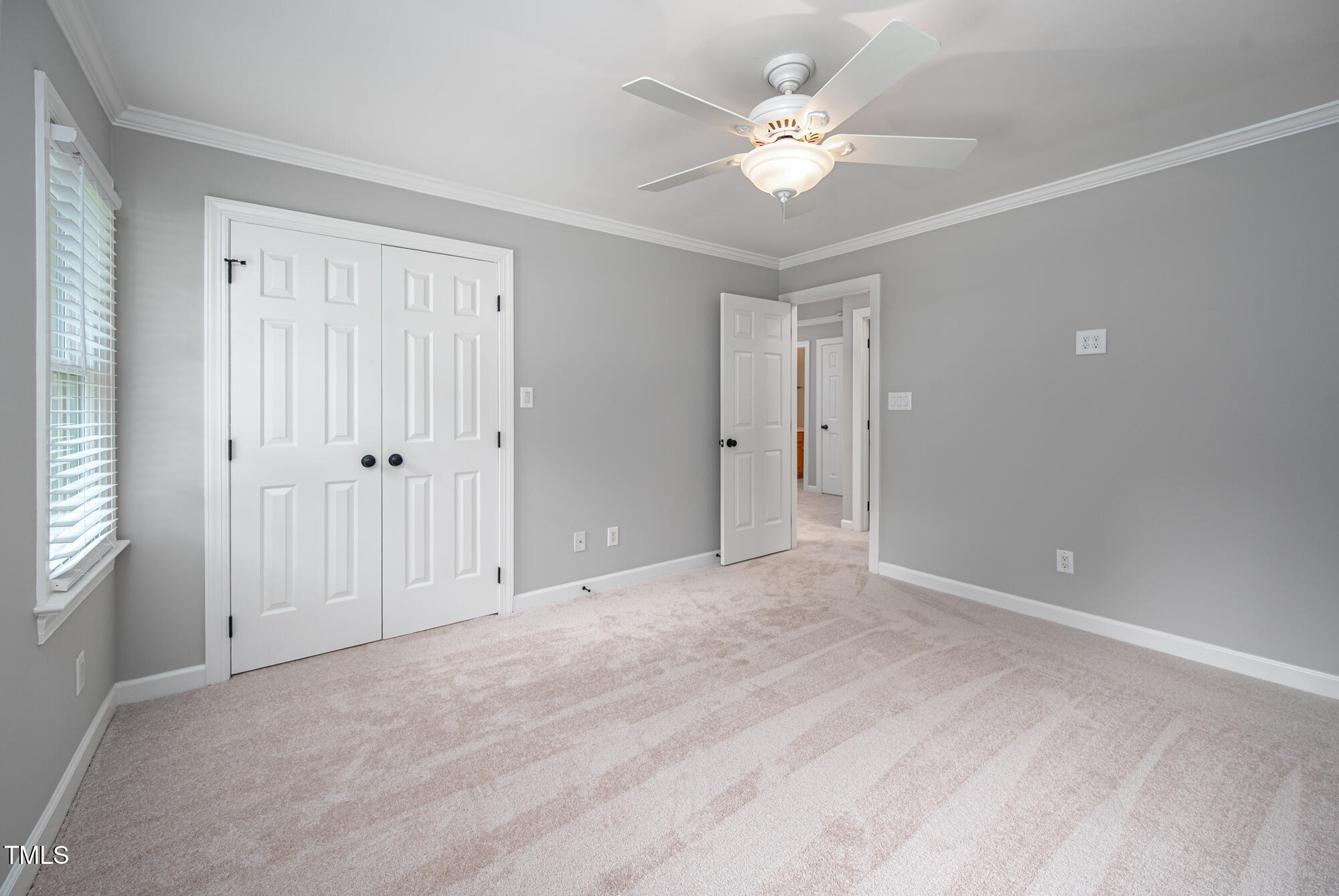 5611 Red Coach Road Durham, NC 27712 - Photo 30 of 51 a view of an empty room with a ceiling fan