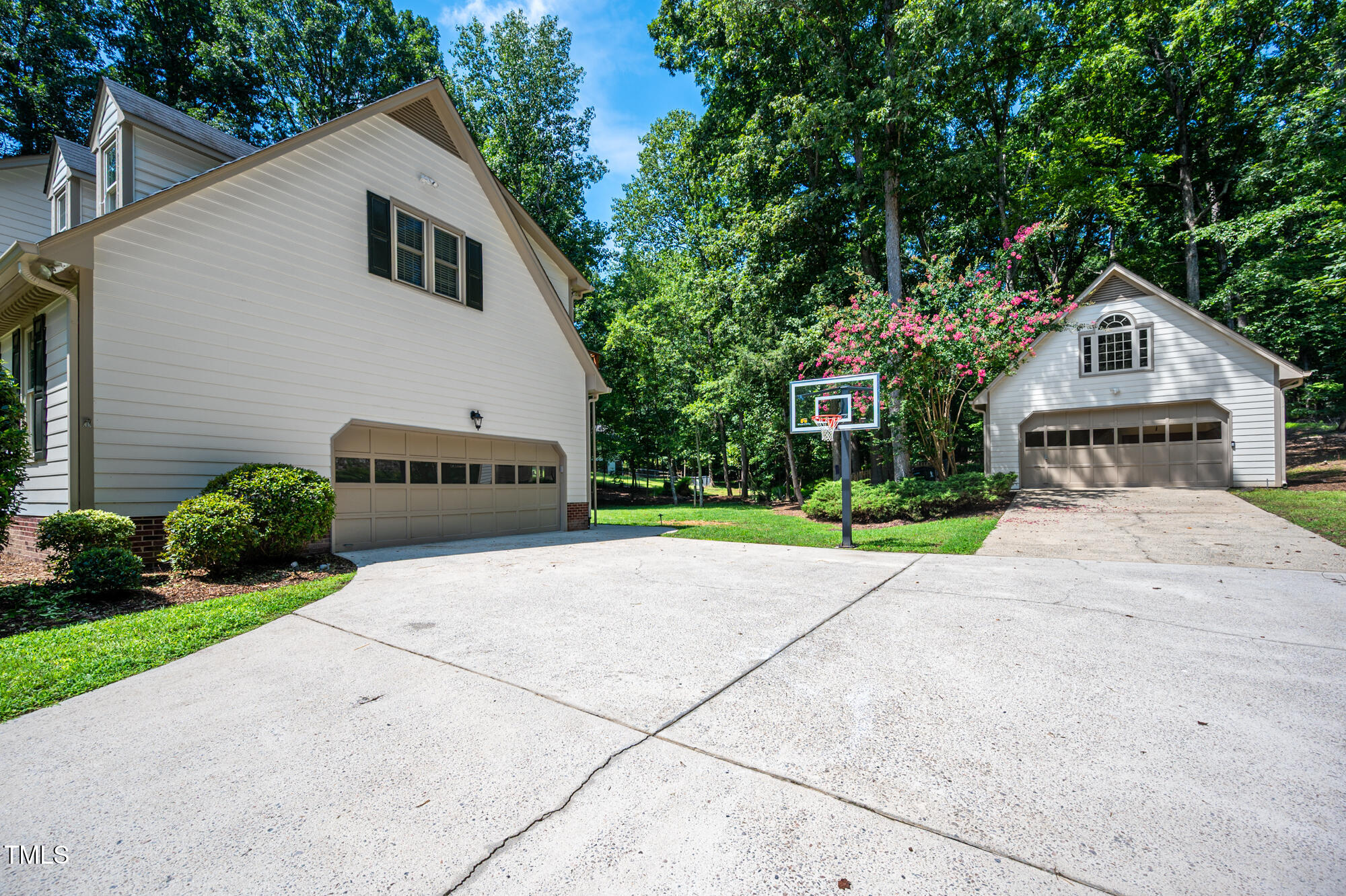 5611 Red Coach Road Durham, NC 27712 - Photo 51 of 51 a front view of a house with a yard and garage