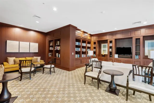 a view of an empty room with cabinet