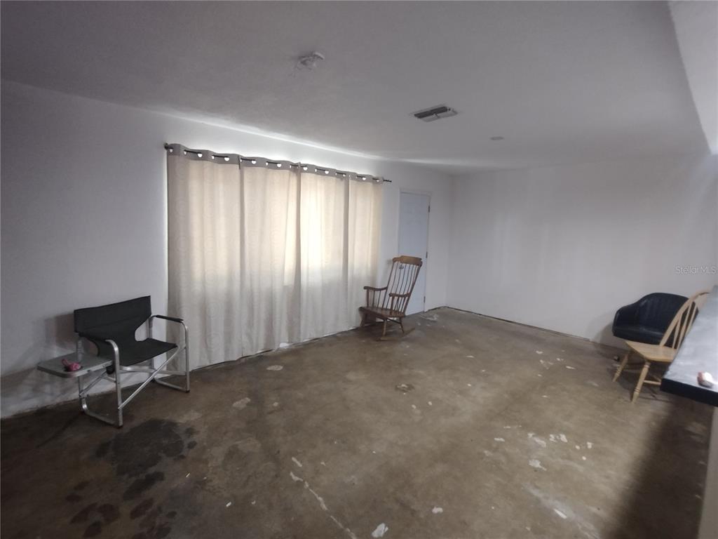 2419 Appian Avenue Spring Hill, FL 34608 - Photo 6 of 21 a view of a room with a window