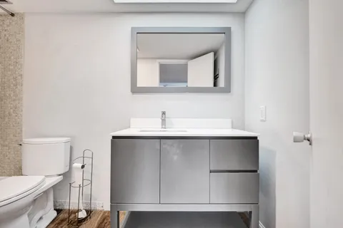 a view of a hallway with washer and dryer