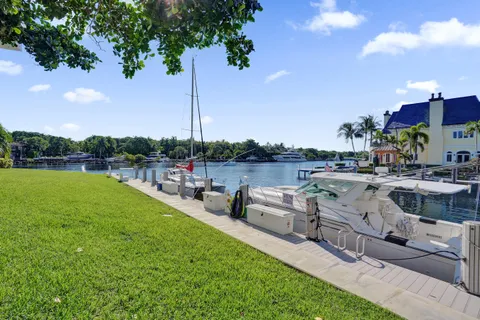 a view of a garden with sitting area