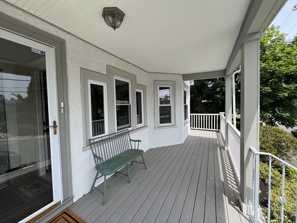 67 Commonwealth Road, Unit 1 Watertown, MA 02472 - Photo 5 of 22 a view of a house with a porch