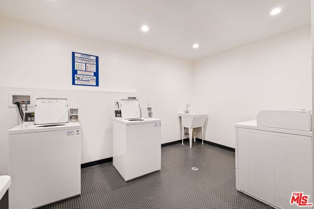 a view of empty room with wooden door