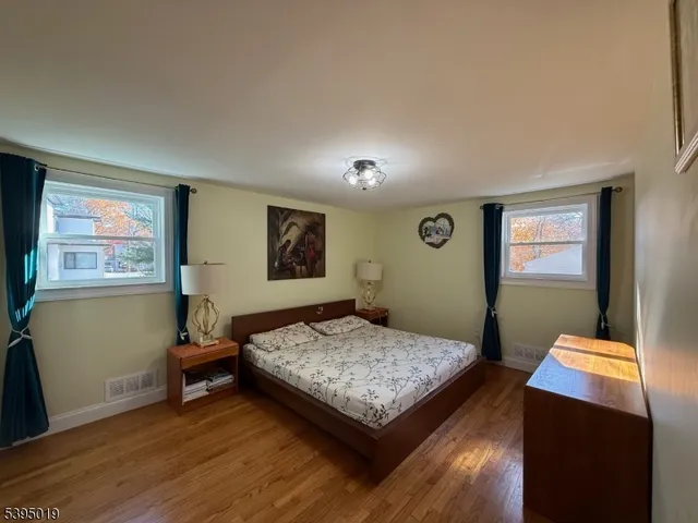 a view of a livingroom with furniture and window