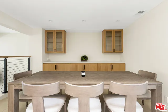 a view of a sink and a table in a room