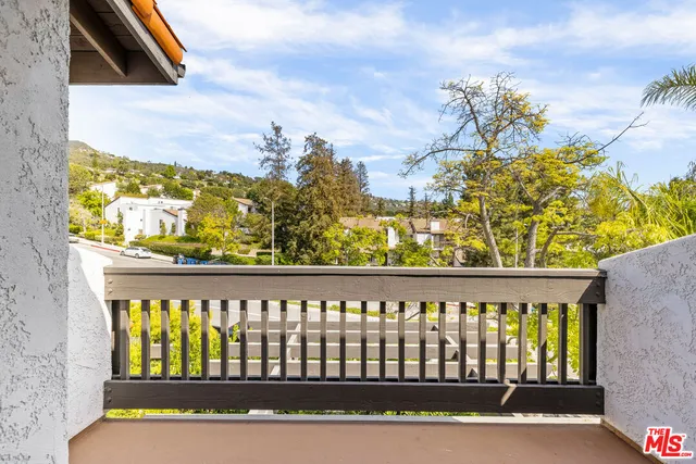 a view of a wooden fence