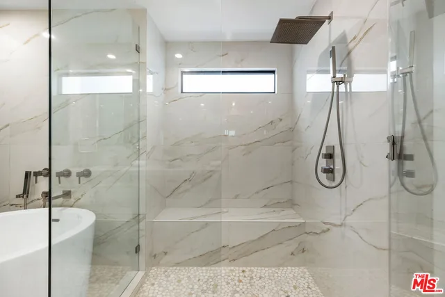 a bathroom with a bath tub