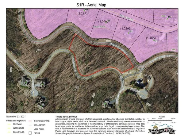 a bed with a bed and a painting on the wall