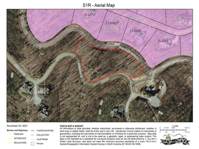 a bed with a bed and a painting on the wall