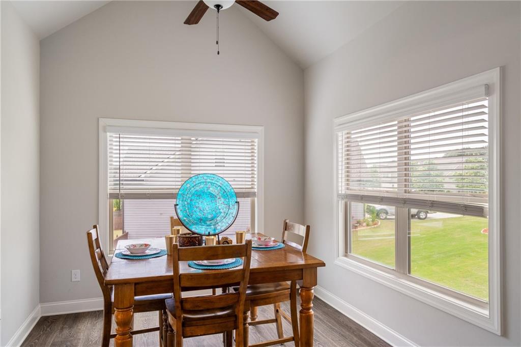 712 Fleeting Way Monroe, GA 30655 - Photo 8 of 29 a view of a dining room with furniture window and outside view