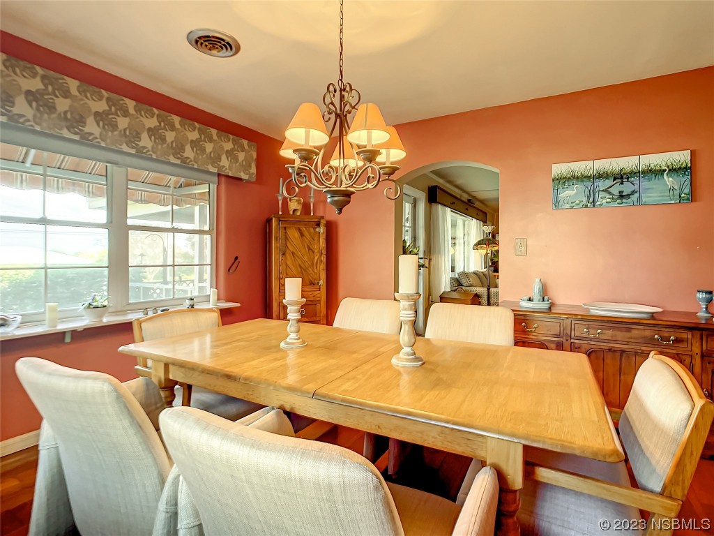 418 North Riverside Drive Edgewater, FL 32132 - Photo 17 of 48 a dining room with furniture and window