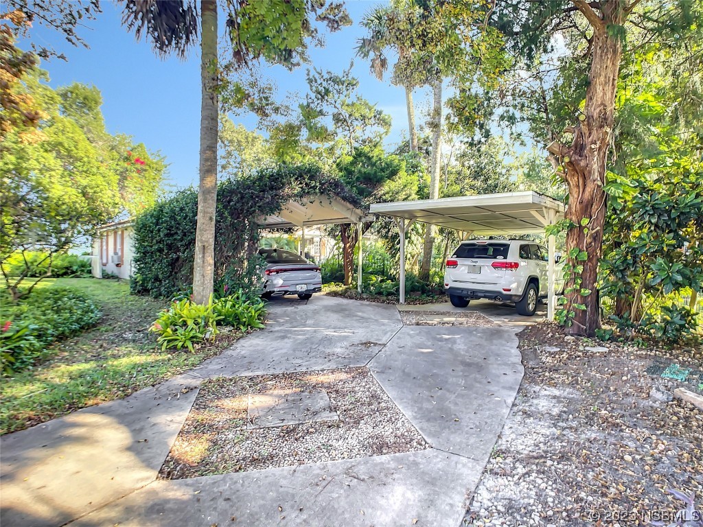 418 North Riverside Drive Edgewater, FL 32132 - Photo 47 of 48 a car parked in front of a house