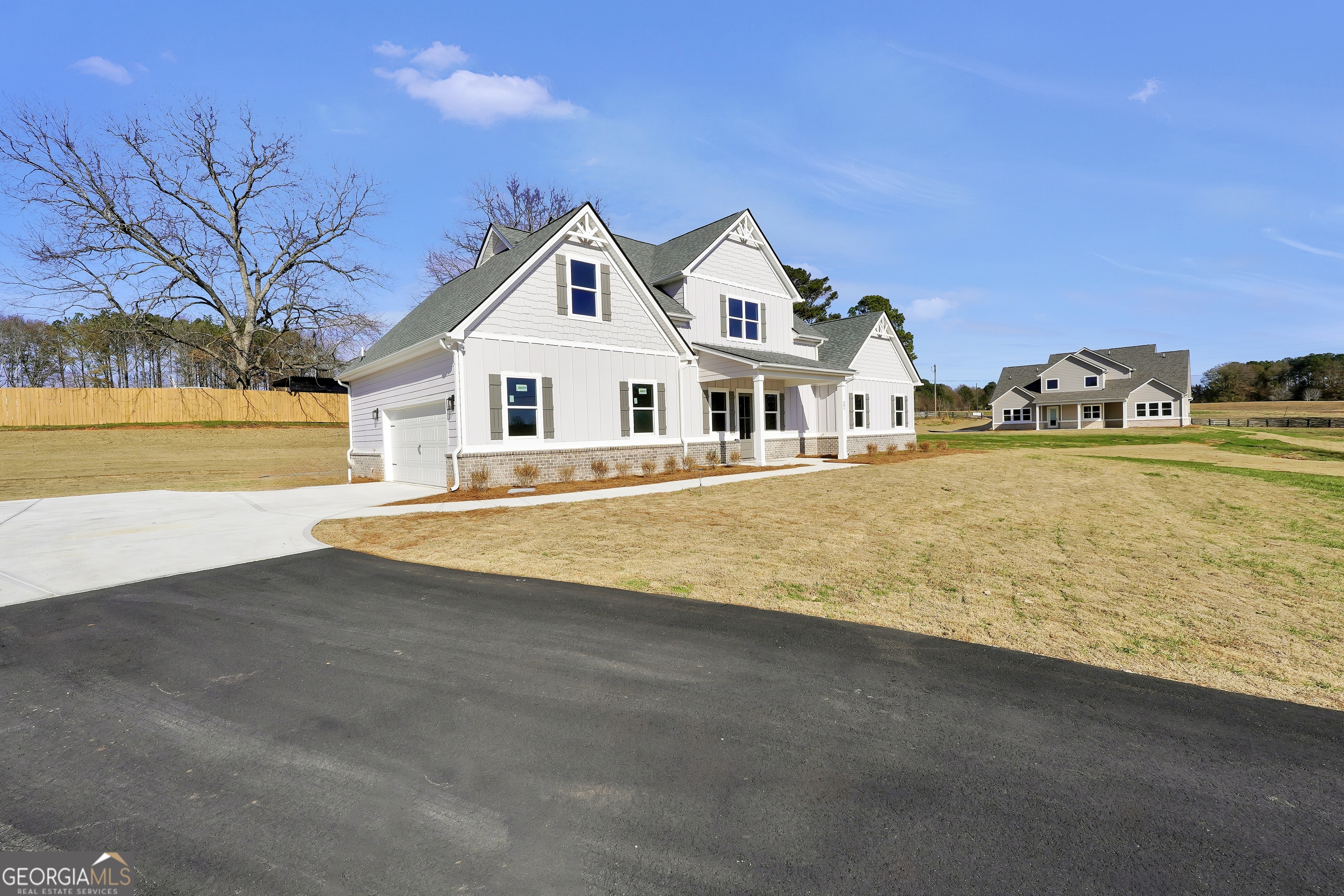 297 East Knight Road McDonough, GA 30252 - Photo 3 of 64 a view of an house with a yard and ocean view