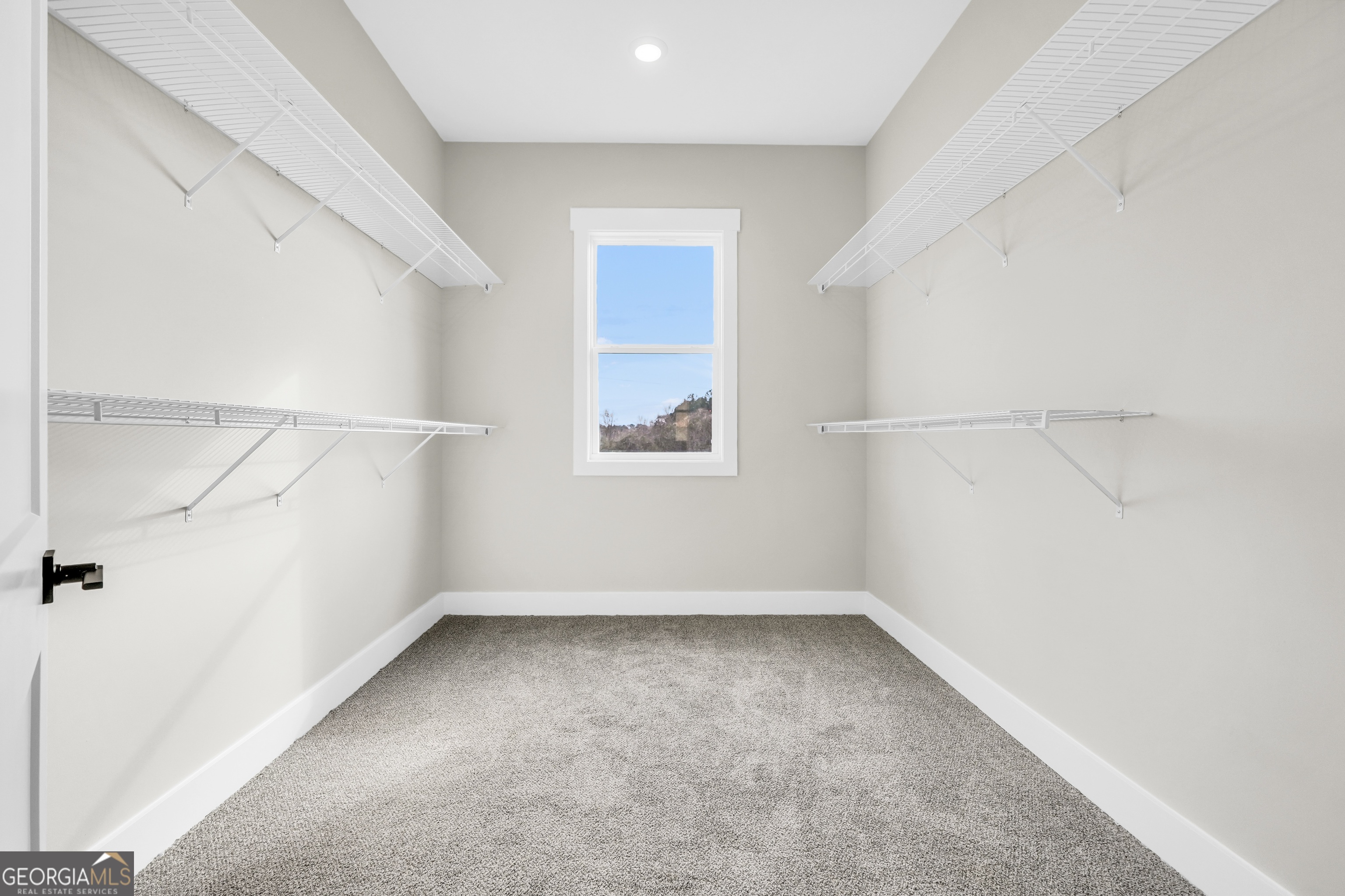 297 East Knight Road McDonough, GA 30252 - Photo 41 of 64 an empty room with a window