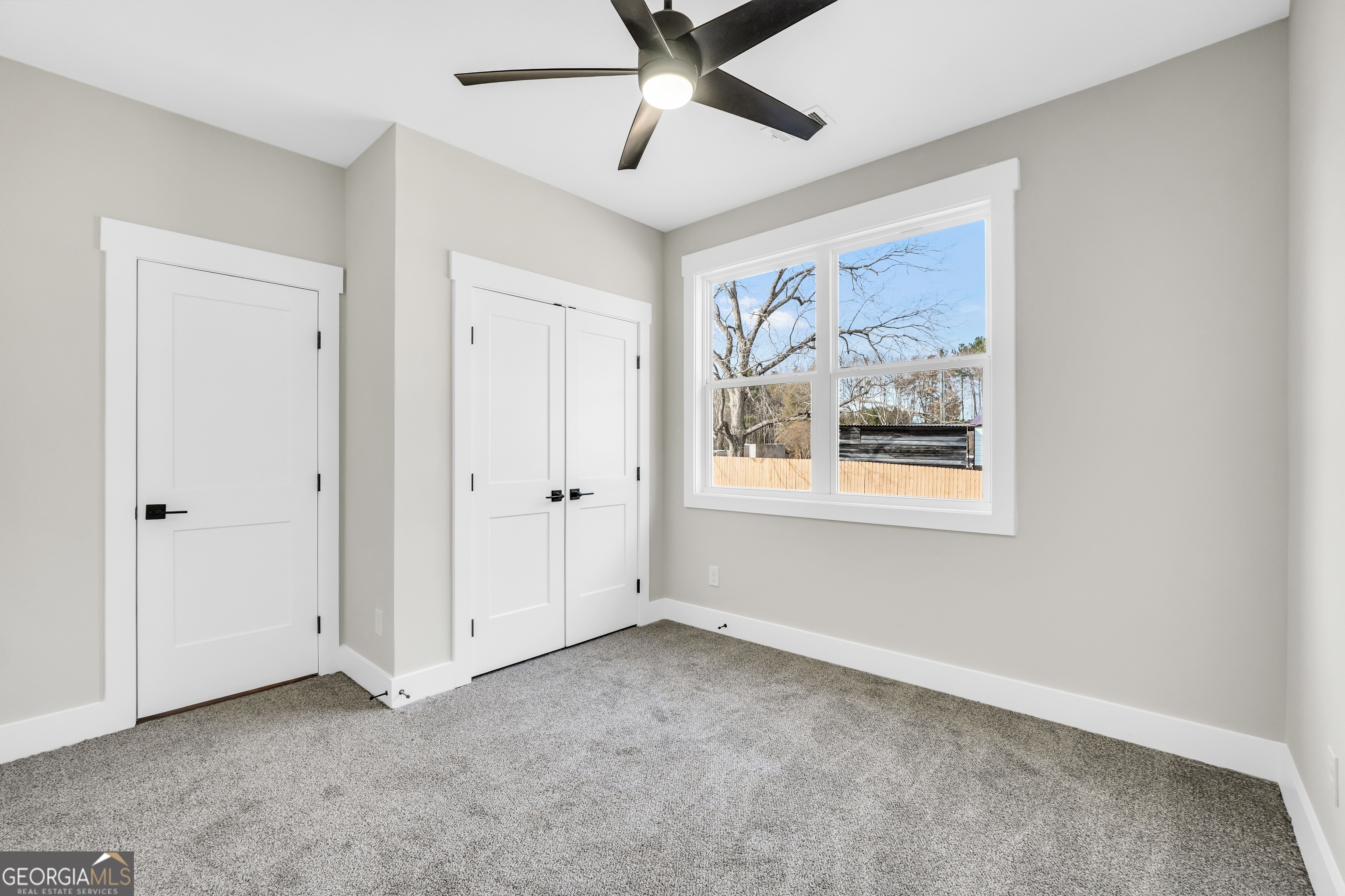 297 East Knight Road McDonough, GA 30252 - Photo 44 of 64 a view of an empty room with a window