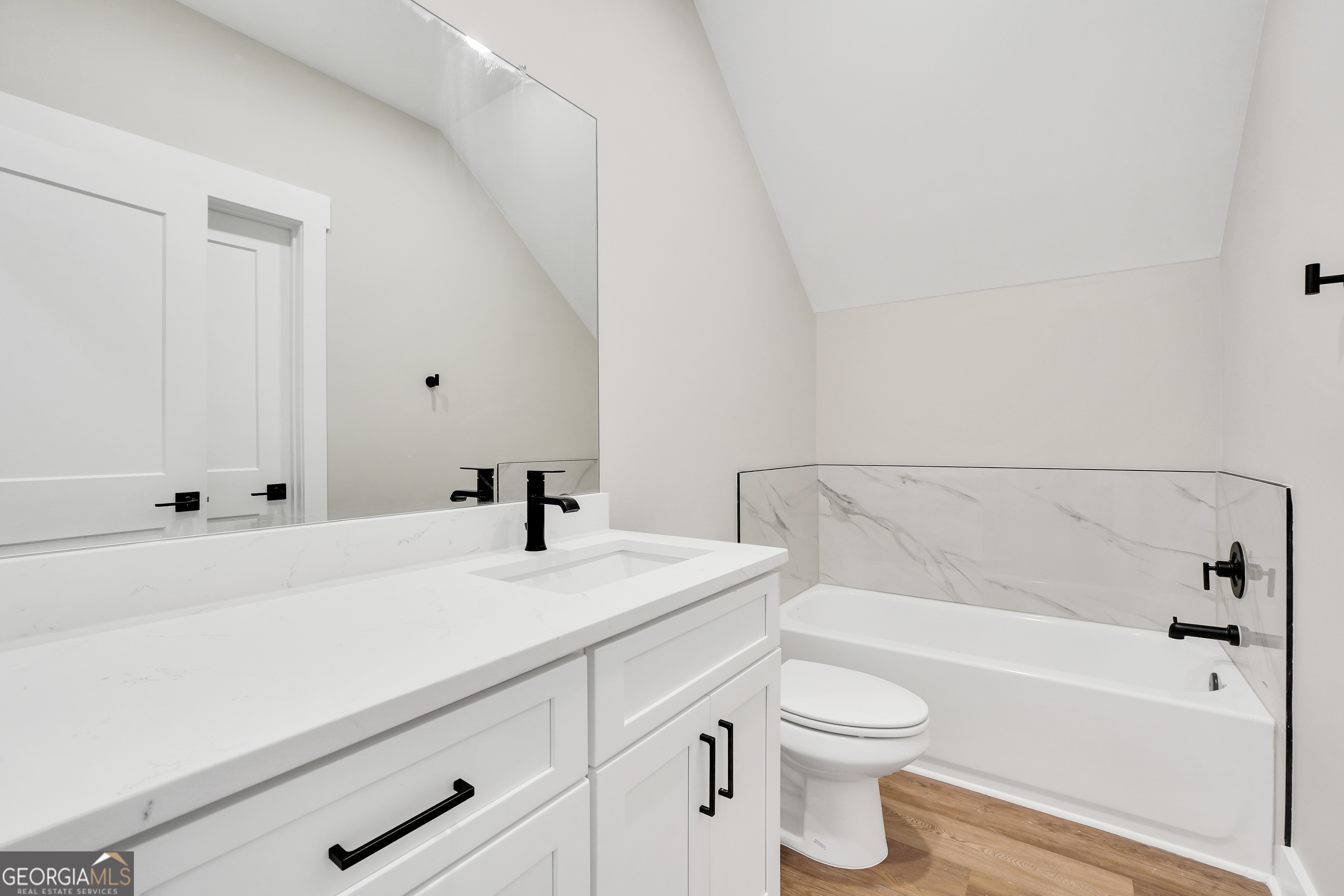 297 East Knight Road McDonough, GA 30252 - Photo 54 of 64 a bathroom with a sink a toilet and a bathtub