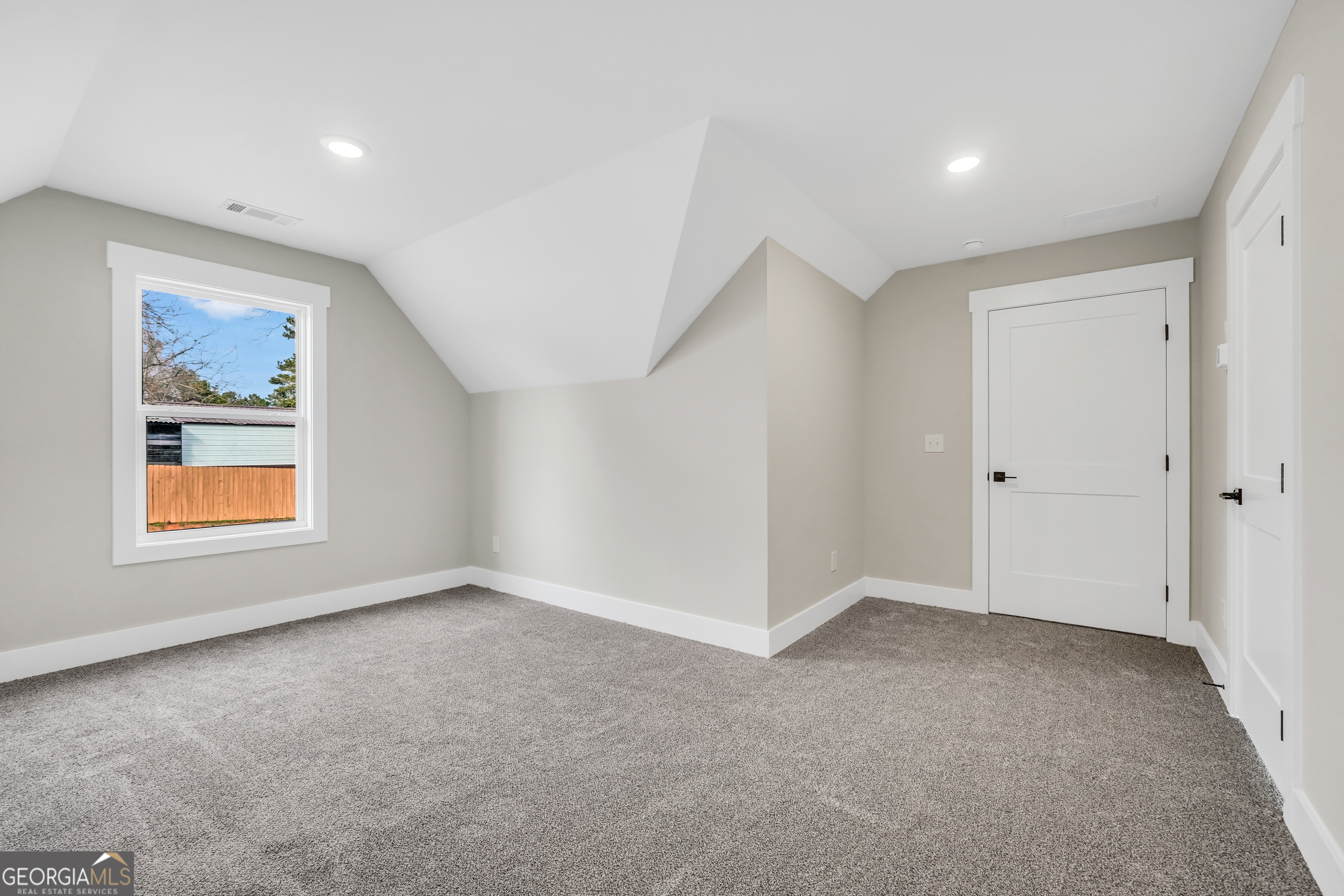 297 East Knight Road McDonough, GA 30252 - Photo 58 of 64 a view of an empty room with a window