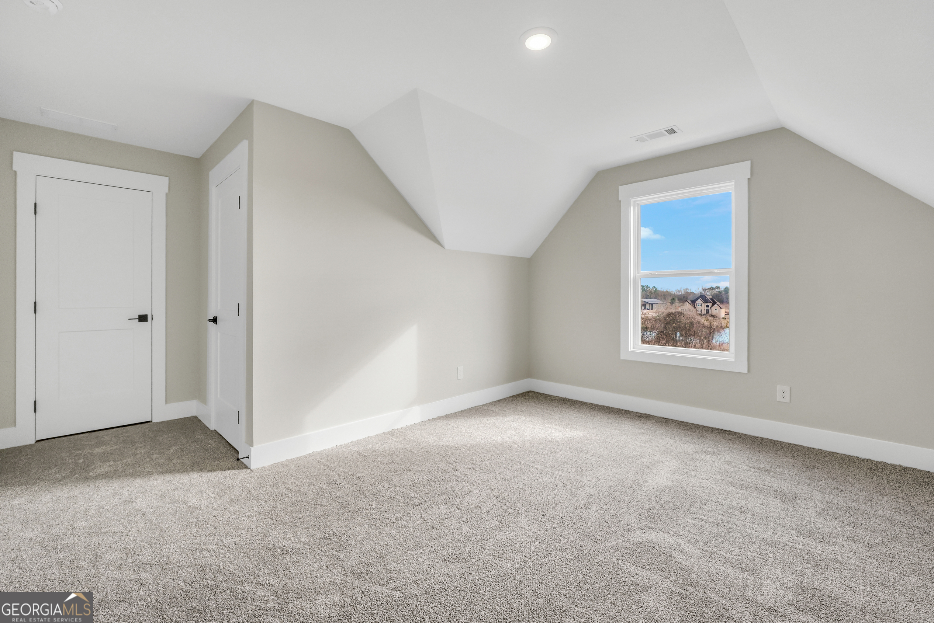297 East Knight Road McDonough, GA 30252 - Photo 60 of 64 a view of an empty room with a window