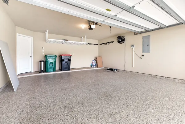 a view of a room with rack and wooden door