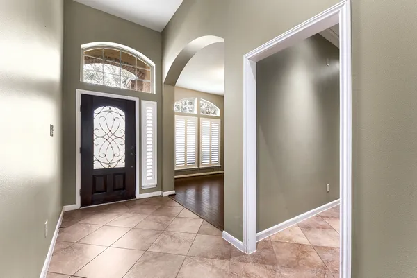 a view of a hallway with entryway