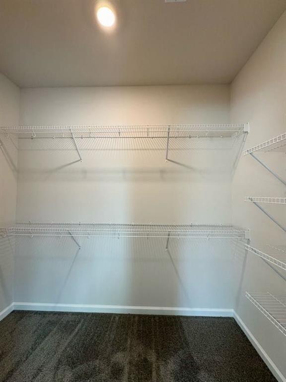 239 Cool Springs Road, Unit 8 Clarkesville, GA 30523 - Photo 15 of 37 a view of a room with racks on the wall