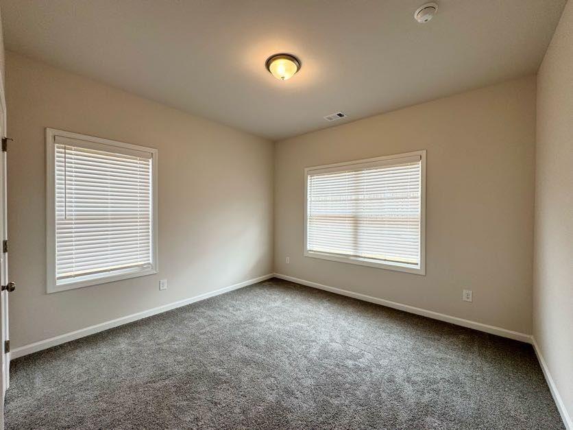 239 Cool Springs Road, Unit 8 Clarkesville, GA 30523 - Photo 19 of 37 a view of an empty room with a window