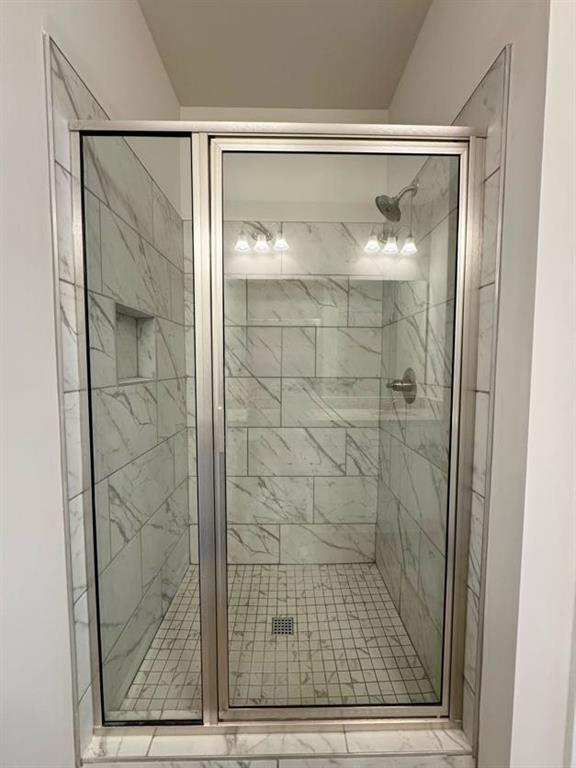 239 Cool Springs Road, Unit 8 Clarkesville, GA 30523 - Photo 25 of 37 a bathroom with a glass shower door