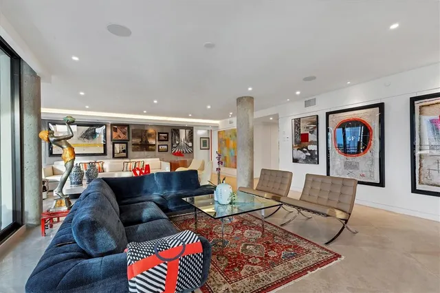 a view of a a dining room with furniture window and outside view