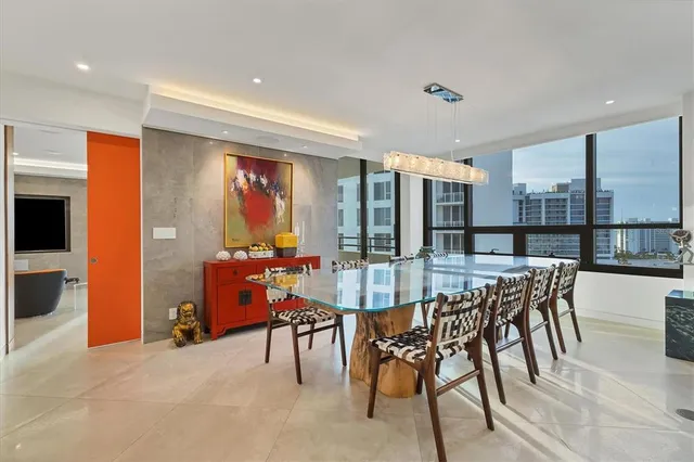 a kitchen with a refrigerator and a sink