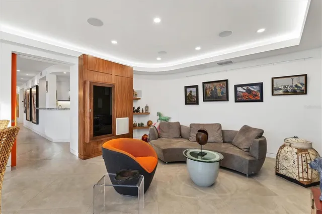 a view of a chairs and table in a balcony