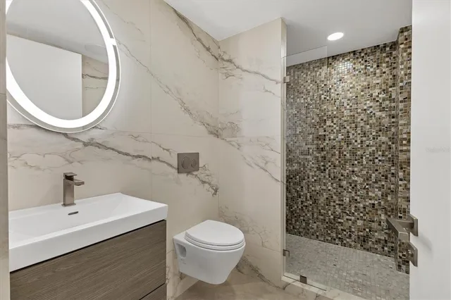 a view of a swimming pool with an outdoor seating