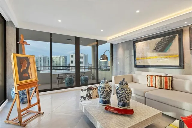 a living room with furniture and window