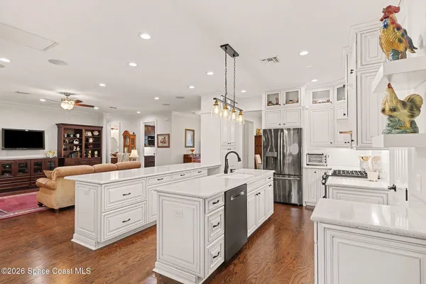 a view of workspace with wooden floor and windows