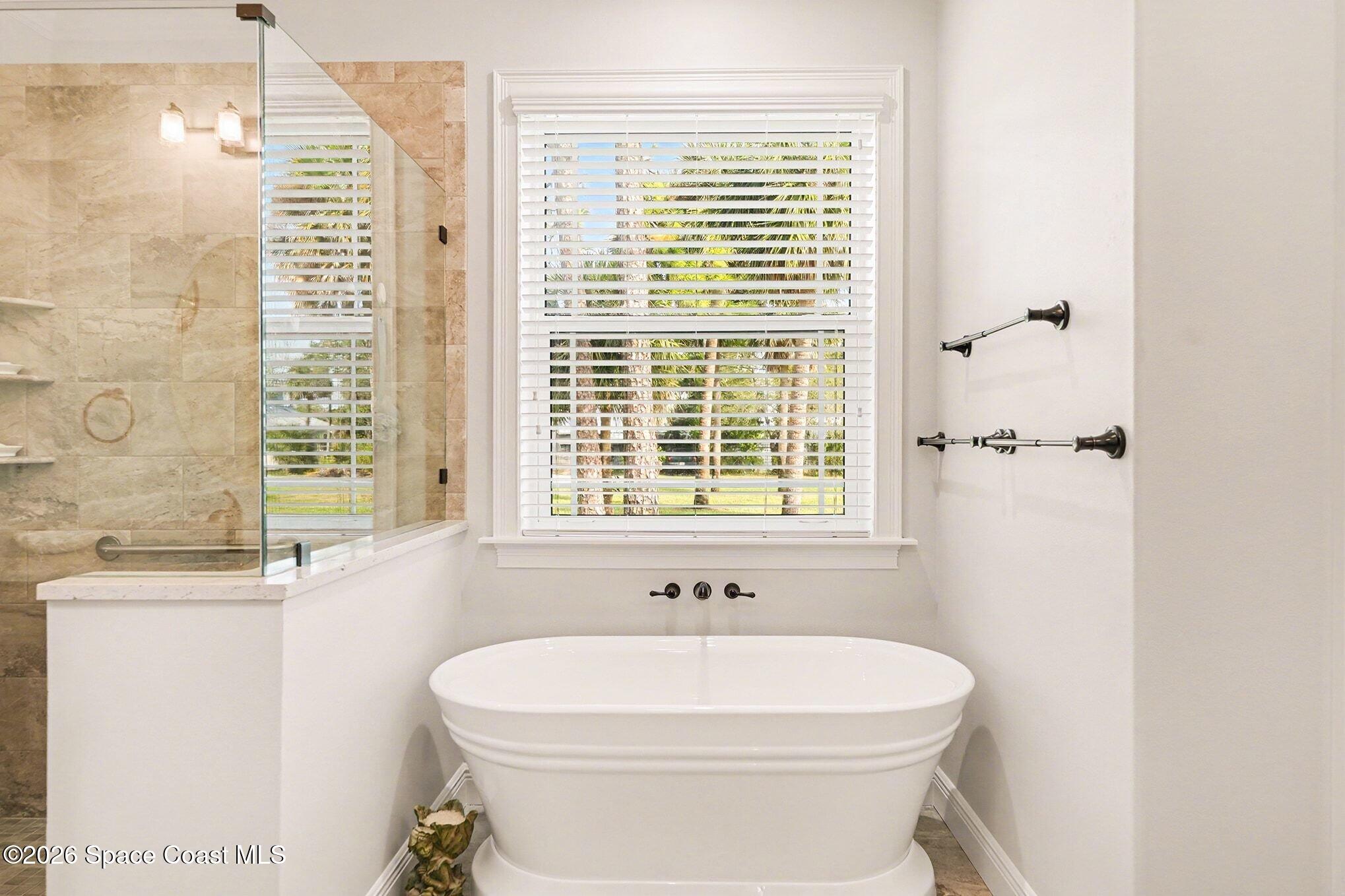 5440 Riveredge Drive Titusville, FL 32780 - Photo 30 of 55 Primary Bathroom Tub and Shower