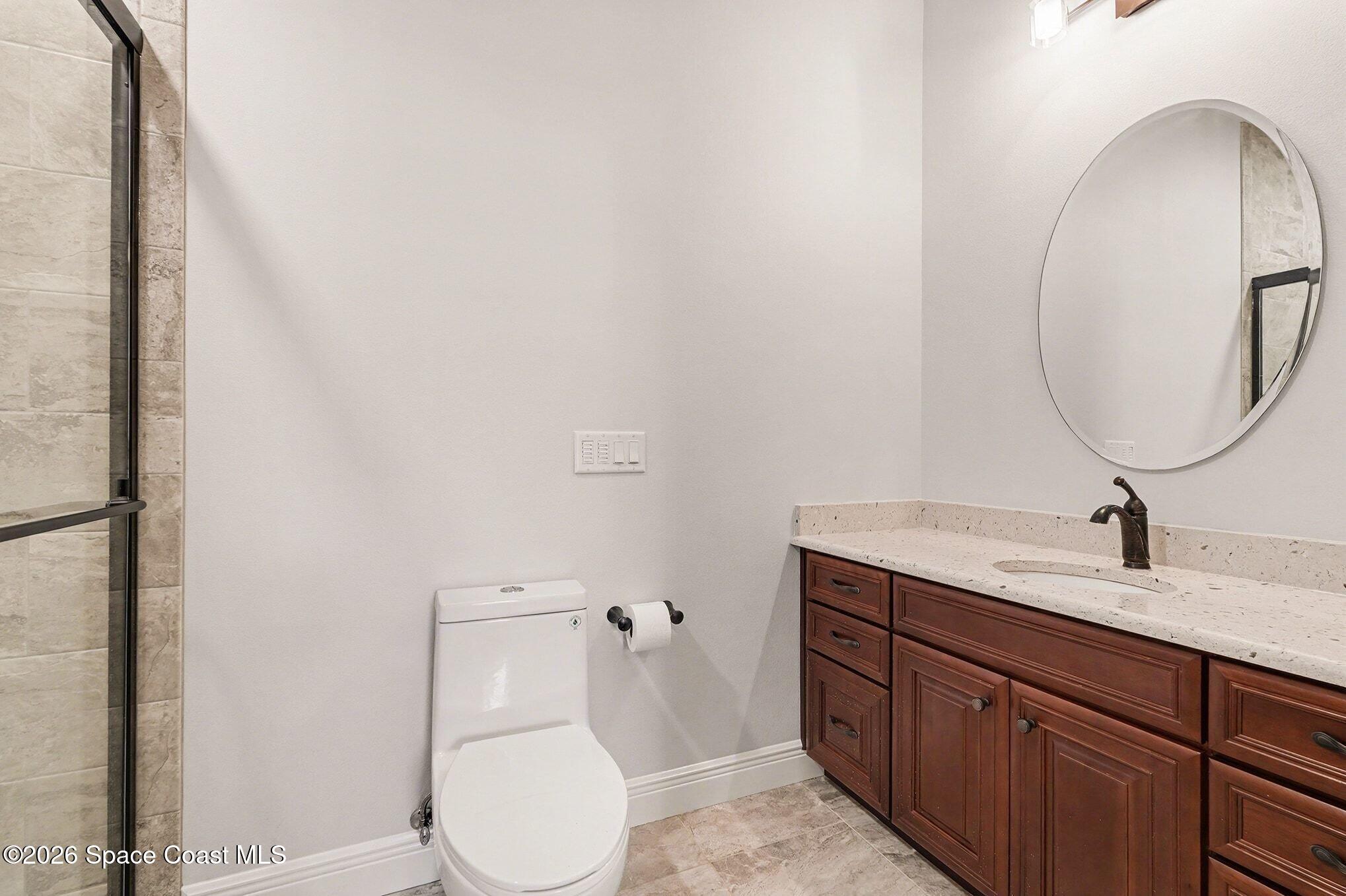 5440 Riveredge Drive Titusville, FL 32780 - Photo 41 of 55 Bedroom 2 ensuite bathroom