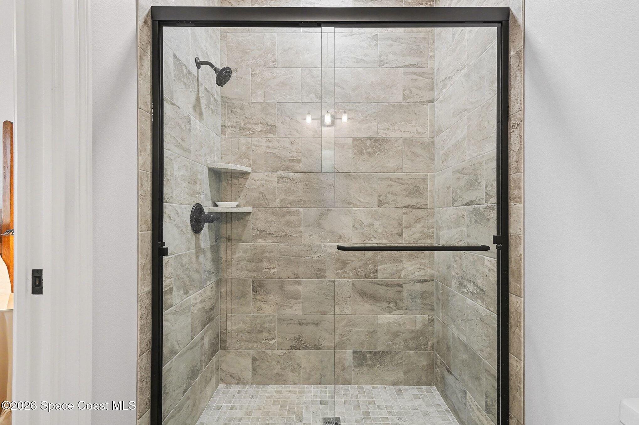 5440 Riveredge Drive Titusville, FL 32780 - Photo 42 of 55 Bedroom 2 shower