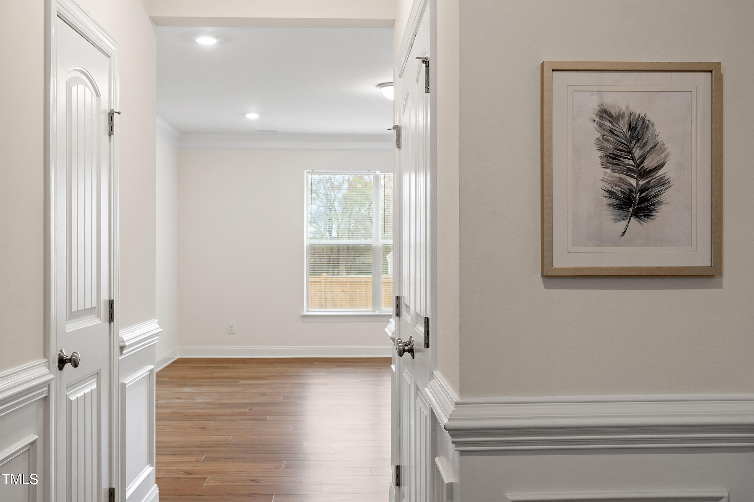 3504 Triad Court Raleigh, NC 27604 - Photo 6 of 34 a view of a bedroom with wooden floor and window