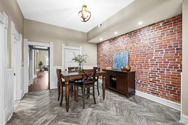 a view of a dining room with furniture