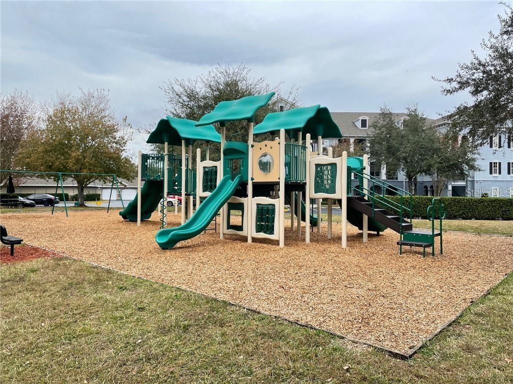 3611 Conroy Road, Unit 825 Orlando, FL 32839 - Photo 19 of 27 a view of a house with a patio