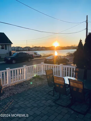 a view of a chairs on roof deck