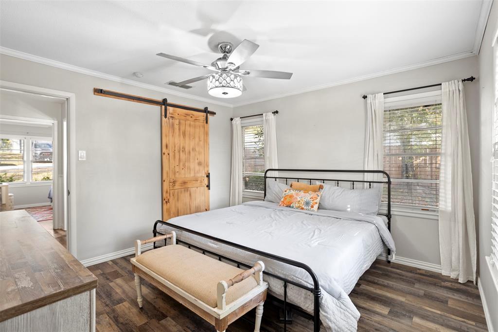 611 East Watkins Street Tyler, TX 75701 - Photo 16 of 29 a bedroom with a bed and window